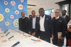 Markus Ipangelwa, Commercial Manager: Windhoek giving guests a tour of the store with Calvin Muniswaswa, Acting Chief Executive Officer, Armando Perny, Chief Mobile Officer, and Ernst Nitschke Acting Chief Commercial Officer looking on